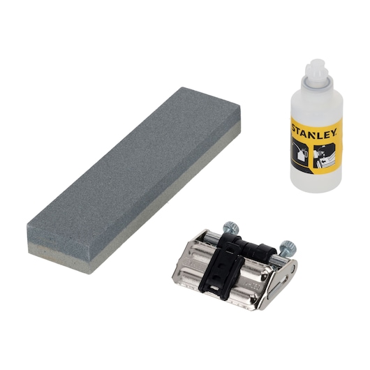 STANLEY 0-16-050 sharpening kit with oil, sharpening stone, and honing guide, product photography, top view.