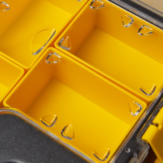 STANLEY 014725R yellow plastic organizer box interior with clear divided compartments, top angle.