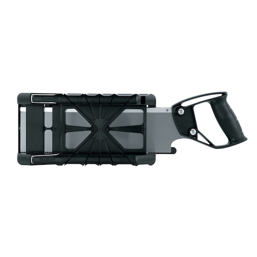 Stanley miter box with saw, black plastic frame, metal saw blade and ergonomic black handle, top view, white background.