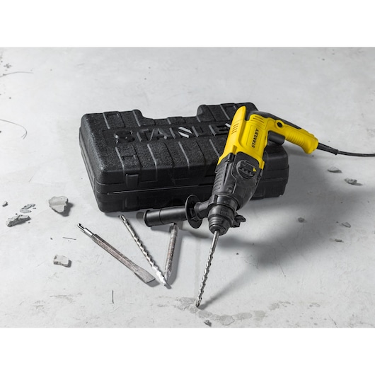 STANLEY SHR263K-BR corded hammer drill with black carrying case and three drill bits, photographed from front angle.
