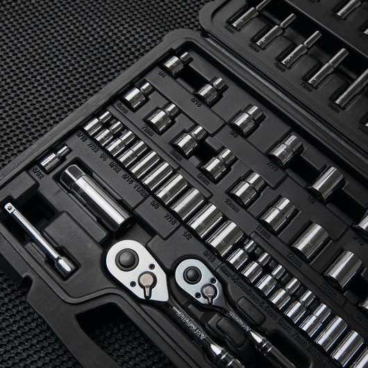 STANLEY STMT71651 photography of chrome socket set and ratchets in a black molded case, angled view.