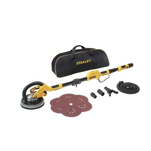 STANLEY SW75-BR drywall sander kit with yellow sander, sanding discs, hose, attachments, and black carrying bag.
